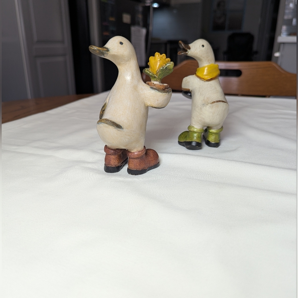 Charming Anthropomorphic Ducks Figurines with Boots, Flower And Watering Can.
